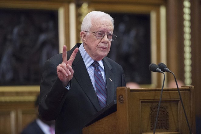 Former U.S. president Jimmy Carter delivers a lecture on the eradication of the Guinea worm, at the House of Lords, February 3, London. Carter has called for Barack Obama to recognize the State of Palestine.